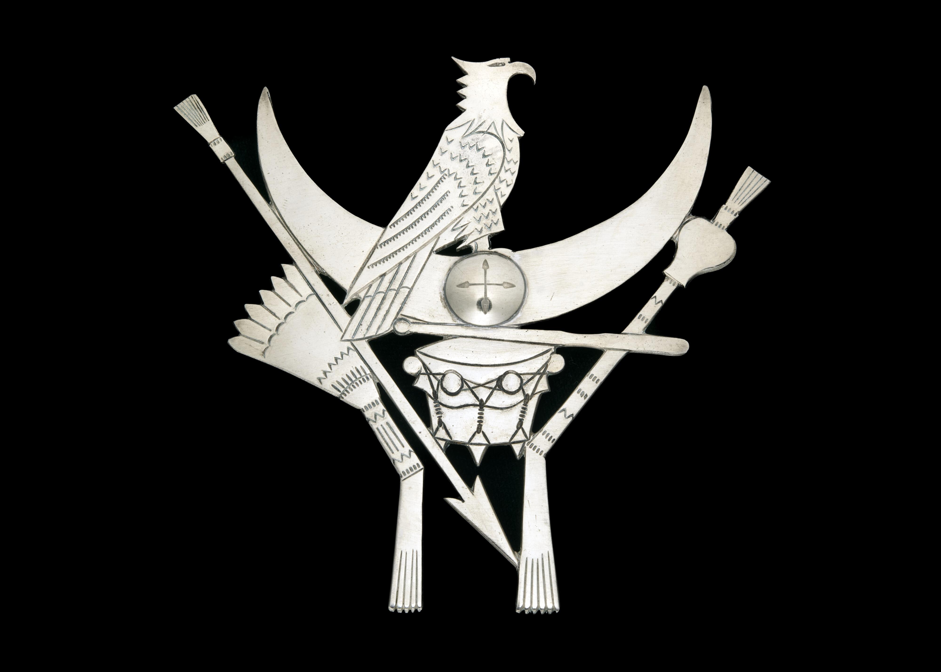 Silver blanket pin with peyote related designs including halfmoon